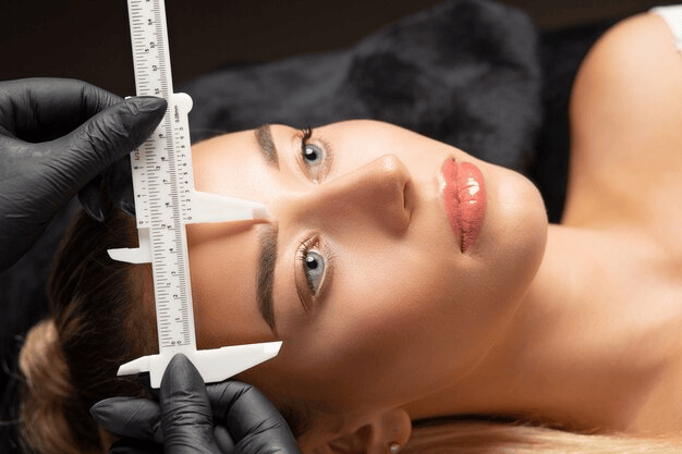 woman-gloves-making-preparation-brow-permanent-makeup-with-ruler